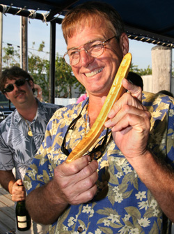 Kim Fisher, son of late treasure hunter Mel Fisher, displays a 23-karat gold bar after it arrived in Key West, Feb. 26, 2008. Estimated to be valued at about $175,000 U.S., the three-pound bar was discovered by Fisher's salvage divers about 35 miles west of Key West. The bar is believed to have come from the wreck of the Spanish galleon Nuestra Senora de Atocha that sank in 1622. Photo by Rob O'Neal/Florida Keys News Bureau